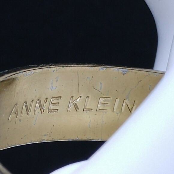 Anne Klein Solid Gold Tone Bangle Bracelet, 7 3/4 Inches, Very Reflective - Picture 3 of 8